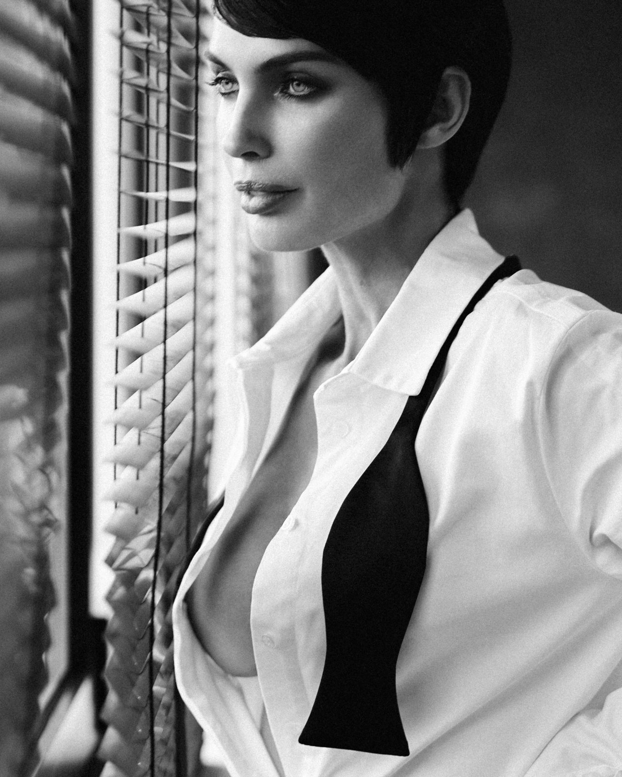 Natalia Boykova, white shirt and bow tie