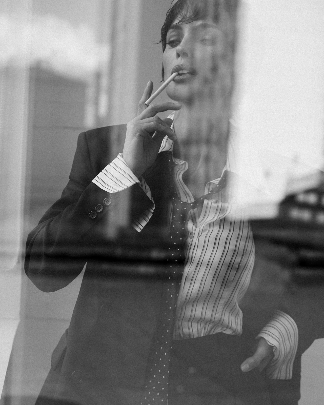 Natalia Boykova behind glass, reflection