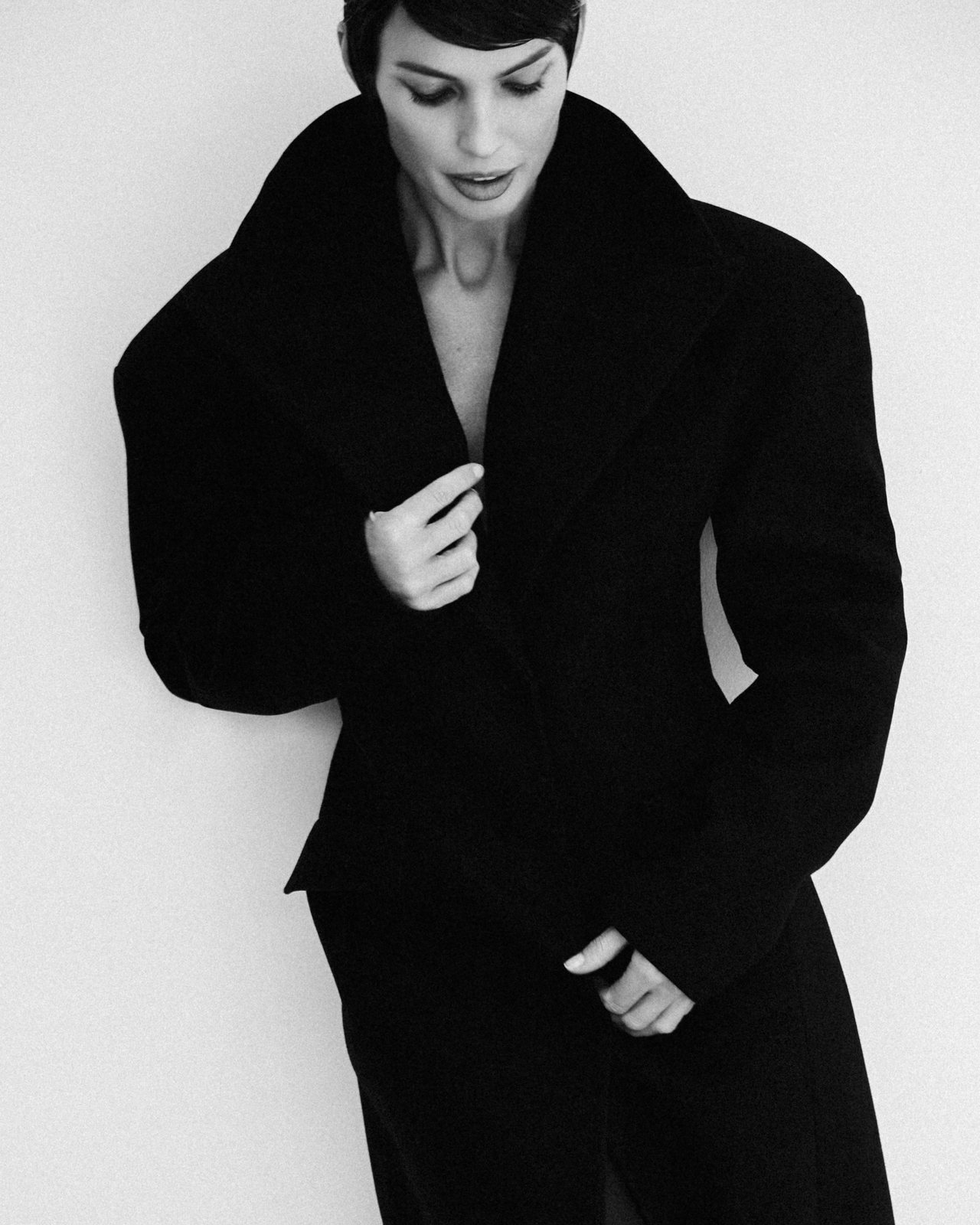 Natalia Boykova, oversized black coat