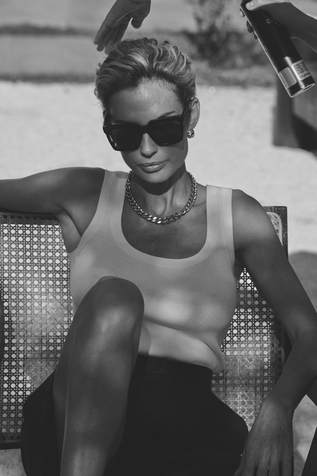Natalia Boykova outdoors in sunglasses and a vest